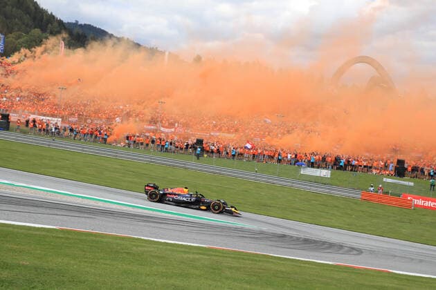 FORMULA 1 - GP of Austria 2022 SPIELBERG,AUSTRIA,09.JUL.22 - MOTORSPORTS, FORMULA 1 - Grand Prix of Austria, Red Bull Ring, sprint race. Image shows Max Verstappen (NED Red Bull Racing). Keywords:fans, smoke.  GEPAxpictures xMarioxBuehner
