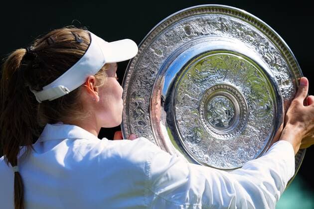 Mandatory Credit: Photo by Javier Garcia Shutterstock (13018057cc) Elena Rybakina holds aloft the Rosewater Dish after victory in Ladies Singles Final Wimbledon Tennis Championships, Day 13, The All England Lawn Tennis and Croquet Club, London, UK - 09 Jul 2022 Wimbledon Tennis Championships, Day 13, The All England Lawn Tennis and Croquet Club, London, UK - 09 Jul 2022  Copyright: xJavierxGarcia Shutterstockx 13018057cc