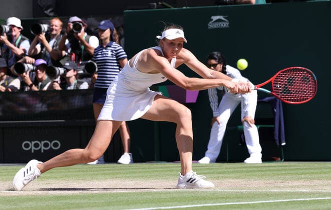 Kazakhstan s Elena Rybakina plays a backhand in her Women s Final match against Tunisian Ons Jabeur at the 2022 Wimbledon championships in London on Saturday, July 9, 2022. Rybakina won the match 3-6,6-2,6-2.  LON202207090722 HUGOxPHILPOTT