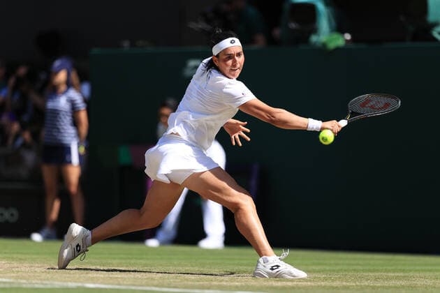 Tennis - Wimbledon (Day 13) 9th July 2022 - Tennis - Wimbledon (Day 13) - Ons Jabeur (TUN) in action against Elena Rybakina (KAZ) during their Ladies Singles Final - Photo: Simon Stacpoole Offside. London UK Copyright: xSimonxStacpoolexOffside
