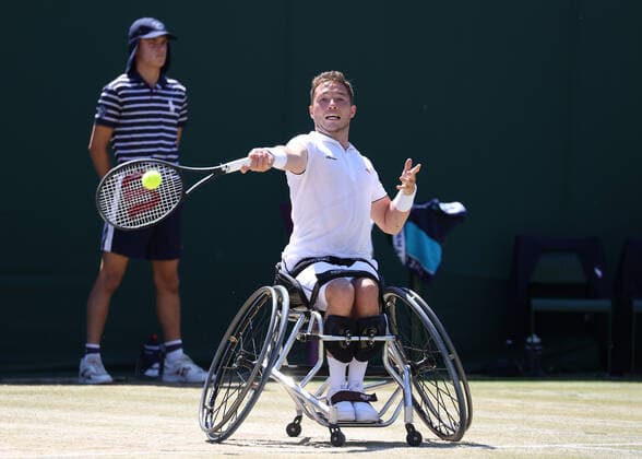 10th July 2022, All England Lawn Tennis and Croquet Club, London, England; Wimbledon Tennis tournament; Alfie Hewett (GBR) plays a forehand to Shingo Kunieda (JPN) during the mens wheelchair final  ActionPlus12407123 JohnxPatrickxFletcher