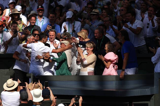 Tennis - Wimbledon (Day 14) 10th July 2022 - Tennis - Wimbledon (Day 14) - Gentlemen s Singles Final Novak Djokovic (SRB) v Nick Kyrgios (AUS) - Novak Djokovic celebrates victory with his coaching team. Photo: Simon Stacpoole Offside. London UK Copyright: xSimonxStacpoolexOffside