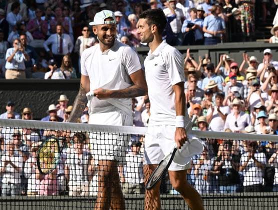 Tennis Championships - Week Two - Day Fourteen - All England Lawn Tennis Club, Wimbledon - Sunday 10th July 2022 Mens Singles Final. Novak Djokovic v Nick Kyrgios Novak Djokovic and Nick Kyrgios share a joke at the net after the match 