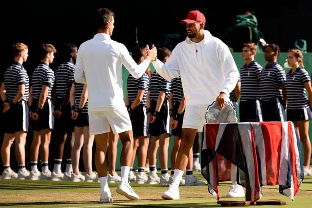 Mandatory Credit: Photo by Ella Ling Shutterstock (13018059fm) Novak Djokovic and Nick Kyrgios after the Men s Singles Final Wimbledon Tennis Championships, Day 14, The All England Lawn Tennis and Croquet Club, London, UK - 10 Jul 2022 Wimbledon Tennis Championships, Day 14, The All England Lawn Tennis and Croquet Club, London, UK - 10 Jul 2022  Copyright: xEllaxLing Shutterstockx 13018059fm