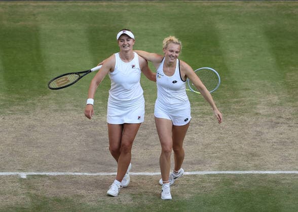 10 July 2022, All England Lawn Tennis and Croquet Club, London, England; Wimbledon Tennis tournament, womens doubles final; Barbora Krejcikova (CZE) and Katerina Siniakova (CZE) celebrate winning the Ladies Doubles Final against Elise Mertens (BEL) and Shuai Zhang (CHN)  ActionPlus12407338 JohnxPatrickxFletcher