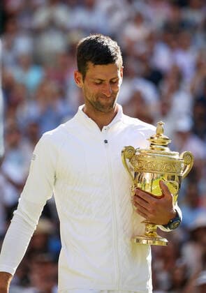 (220711) -- LONDON, July 11, 2022 -- Novak Djokovic holds his trophy after winning the men s singles final match between Novak Djokovic of Serbia and Nick Kyrgios of Australia at Wimbledon Tennis Championship in London, Britain, on July 10, 2022. ) (SP)BRITAIN-LONDON-TENNIS-WIMBLEDON-MEN S SINGLES-FINAL LixYing 