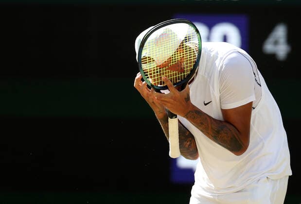 (220711) -- LONDON, July 11, 2022 -- Nick Kyrgios reacts during the men s singles final match between Novak Djokovic of Serbia and Nick Kyrgios of Australia at Wimbledon Tennis Championship in London, Britain, on July 10, 2022. ) (SP)BRITAIN-LONDON-TENNIS-WIMBLEDON-MEN S SINGLES-FINAL LixYing 