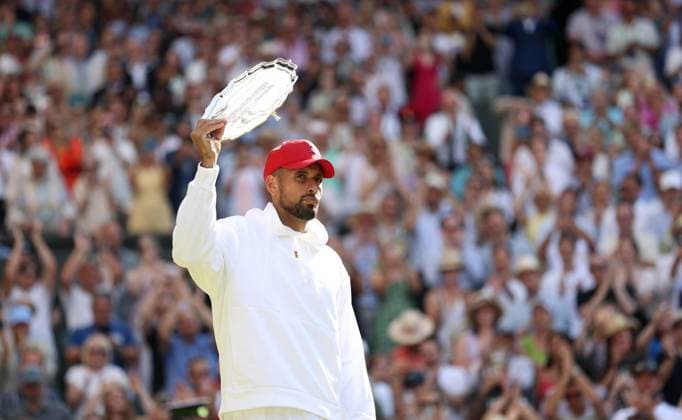 (220711) -- LONDON, July 11, 2022 -- Nick Kyrgios holds the trophy on the awarding ceremony after the men s singles final match between Novak Djokovic of Serbia and Nick Kyrgios of Australia at Wimbledon Tennis Championship in London, Britain, on July 10, 2022. ) (SP)BRITAIN-LONDON-TENNIS-WIMBLEDON-MEN S SINGLES-FINAL LixYing 