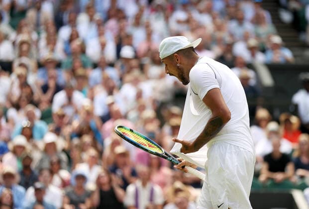 (220711) -- LONDON, July 11, 2022 -- Nick Kyrgios celebrates scoring during the men s singles final match between Novak Djokovic of Serbia and Nick Kyrgios of Australia at Wimbledon Tennis Championship in London, Britain, on July 10, 2022. ) (SP)BRITAIN-LONDON-TENNIS-WIMBLEDON-MEN S SINGLES-FINAL LixYing 