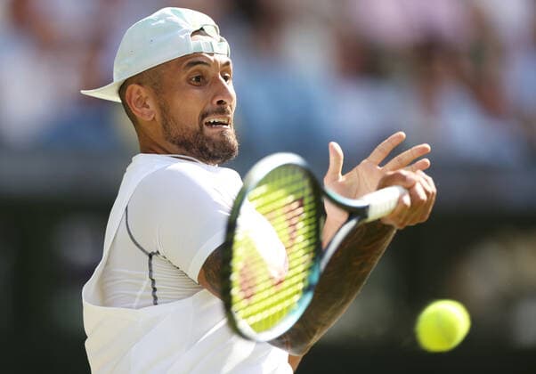 (220711) -- LONDON, July 11, 2022 -- Nick Kyrgios competes during the men s singles final match between Novak Djokovic of Serbia and Nick Kyrgios of Australia at Wimbledon Tennis Championship in London, Britain, on July 10, 2022. ) (SP)BRITAIN-LONDON-TENNIS-WIMBLEDON-MEN S SINGLES-FINAL LixYing 