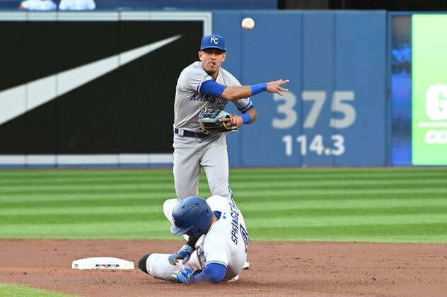 July 14, 2022, Toronto, ON, Canada: Kansas City Royals second baseman Nicky Lopez, top, forces out Toronto Blue Jays centre fielder George Springer and throws to first base to complete a double play on Vladimir Guerrero Jr. in first inning of American League baseball action in Toronto, Thursday, July 14, 2022. Kevin Nicky Lopez, George Springer - ZUMAc35_ 20220714_zaf_c35_075 Copyright: xJonxBlackerx