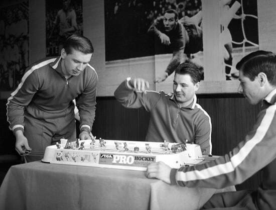Ice hockey, Eishockey Championship 687952 01.03.1969 Ice Hockey World Championship, WM, Weltmeisterschaft Members of the USSR national team, Nationalteam Vladimir Lutchenko, Igor Ramishevsky and Valery Kharlamov playing table ice hockey. Yuriy Somov Sputnik Stockholm Sweden  Copyright: xYuriyxSomovx