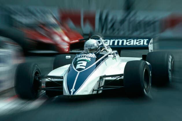 Brabham BT 49 D vom Team Parmalat Racing Team pilotiert von Ricardo Patrese auf dem Kurs in Monaco 1982 or Didier Pironi im Ferrari 1,5 V6t *** Brabham BT 49 D of the Parmalat Racing Team piloted by Ricardo Patrese on the Monaco circuit in 1982 or Didier Pironi in the Ferrari 1.5 V6t