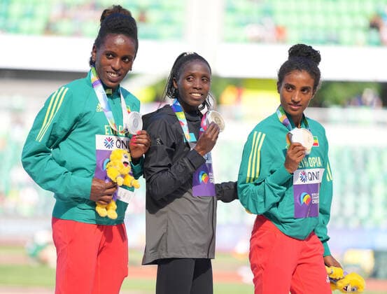 (220722) -- EUGENE, July 22, 2022 -- Gold medalist Kazakhstan s Norah Jeruto (C), silver medalist Ethiopia s Werkuha Getachew (L) and bronze medalist Ethiopia s Mekides Abebe attend the women s 3,000m steeplechase awarding ceremony at the World Athletics Championships Oregon22 in Eugene, Oregon, the United States, July 21, 2022. ) (SP)U.S.-EUGENE-ATHLETICS-WORLD CHAMPIONSHIPS-WOMEN S 3000M STEEPLECHASE-AWARDING CEREMONY WuxXiaoling 