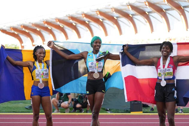 (220723) -- EUGENE, July 23, 2022 -- Shaunae Miller-Uibo (C) of Bahamas, Marileidy Paulino (R) of the Dominican Republic and Sada Williams of Barbados celebrate after the women s 400m final at the World Athletics Championships Oregon22 in Eugene, Oregon, the United States, July 22, 2022. ) (SP)U.S.-EUGENE-ATHLETICS-WORLD CHAMPIONSHIPS-WOMEN S 400M FINAL WangxYing 