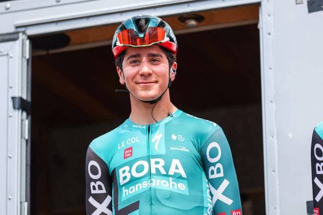 TEMPLOUX, BELGIUM - JULY 23 : Cian Uijtdebroeks of Bora - HansGrohe on the podium before the start of the race on the airfield of Temploux. Pictured on July 23, 2022 in Temploux, Belgium - 23 07 2021 ( Tour De Walonnie E1 PhotoNews Panoramic 
