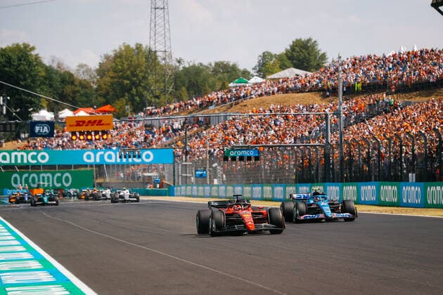 16 LECLERC Charles (mco), Scuderia Ferrari F1-75, 31 OCON Esteban (fra), Alpine F1 Team A522, action during the Formula 1 Aramco Magyar Nagydij 2022, Hungarian Grand Prix 2022, 12th round of the 2022 FIA Formula One World Championship, WM, Weltmeisterschaft from July 28 to 31, 2022 on the Hungaroring, in Mogyorod, Hungary - F1 - HUNGARIAN GRAND PRIX 2022 DPPI Panoramic 00122030__V2_3052