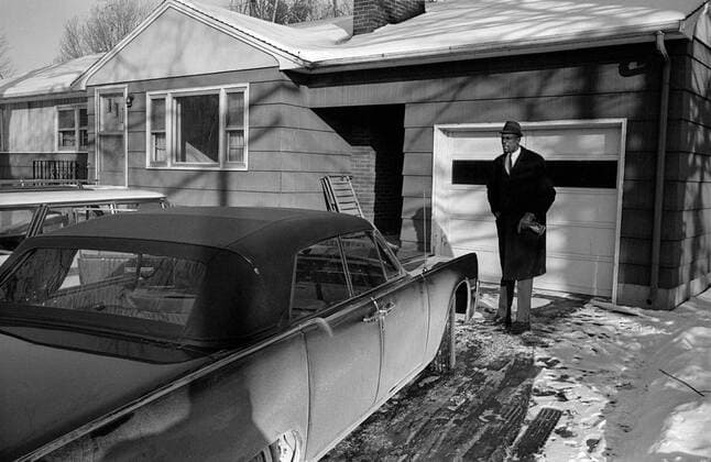 Bill Russell 13 December 1963, Boston - Basketball Feature - Bill Russell stands on his driveway before getting into his car - Photo: Gerry Cranham Offside. Boston USA Copyright: xGerryxCranhamx xOffsidexOffside