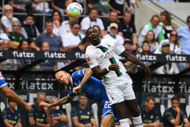 MOENCHENGLADBACH, GERMANY - AUGUST 6, 2022: Kevin Vogt vs Marcus Thuram. The football match of Bundesliga Borussia Mönchengladbach vs TSG 1899 Hoffenheim.  Copyright: xVITALIIxKLIUIEVx