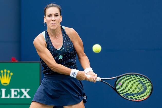 TORONTO, ON - AUGUST 08: Nuria Parrizas-Diaz returns the ball during her National Bank Open tennis tournament first round match on August 8, 2022, at Sobeys Stadium in Toronto, ON, Canada. (Photo by Julian Avram Icon Sportswire via Getty Images) TENNIS: AUG 08 National Bank Open Icon2208081354