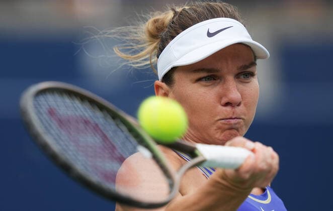 (220809) -- TORONTO, Aug. 9, 2022 -- Simona Halep of Romania returns the ball during the first round of women s singles match between Donna Vekic of Croatia and Simona Halep of Romania at the 2022 National Bank Open in Toronto, Canada, on Aug. 8, 2022. (Photo by Xinhua) (SP)CANADA-TORONTO-TENNIS-NATIONAL BANK OPEN-WOMEN S SINGLES ZouxZheng 