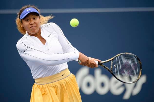 August 9, 2022, Toronto, ON, Canada: Naomi Osaka, of Japan, returns the ball during a match against Kaia Kanepi, of Estonia, during the National Bank Open tennis tournament in Toronto on Tuesday, Aug. 9, 2022. Canada News - August 9, 2022 - ZUMAc35_ 20220809_zaf_c35_128 Copyright: xChristopherxKatsarovx