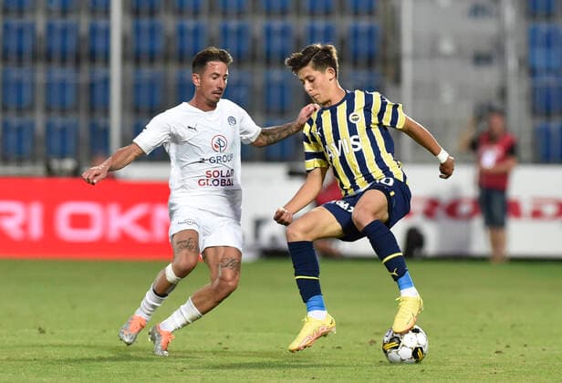 From left Milan Petrzela of Slovacko and Arda Guler of Fenerbahce in action during the European Football League third qualifying round return match: FC Slovacko vs Fenerbahce Istanbul in Uherske Hradiste, Czech Republic, August 11, 2022. (CTKxPhoto DaliborxGluck) CTKPhotoP2022081107553  dg012
