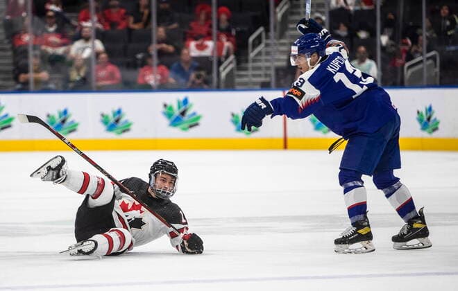 August 11, 2022, EDMONTON, AB, CANADA: Canada s Connor Bedard (16) is checked by Slovakia s Lubomir Kupco (13) during second period IIHF World Junior Hockey Championship action in Edmonton on Thursday August 11, 2022. Canada News - August 11, 2022  - ZUMAc35_ 20220811_zaf_c35_240 Copyright: xJasonxFransonx