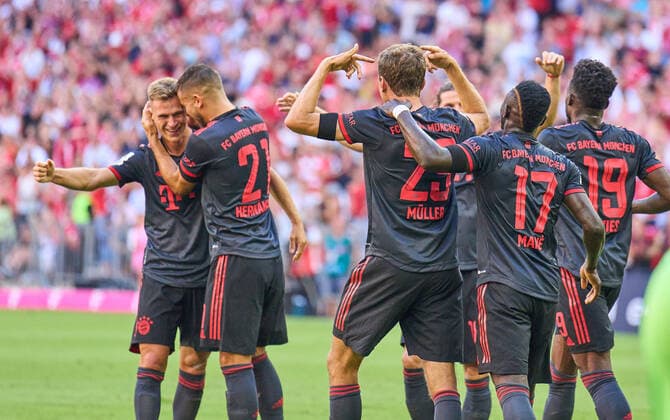 Sport Themen der Woche KW32 Joshua KIMMICH, FCB 6 shoots Thomas MUELLER, MÜLLER, FCB 25 celebrates his goal, happy, laugh, celebration, scores, shoots goal , Tor, Treffer, Torschuss, 2-0, in the match FC BAYERN MÜNCHEN - VFL WOLFSBURG 1.German Football League on Aug 14, 2022 in Munich, Germany. Season 2022 2023, matchday 2, 1.Bundesliga, FCB, München, 2.Spieltag