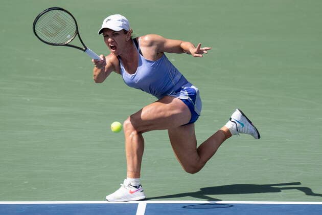 August 14, 2022, TORONTO, ON, CAN: Simona Halep, of Romania, hits a return to BrazilöÄÃ s Beatriz Haddad Maia during National Bank Open finals tennis tournament action in Toronto on Sunday, August 14, 2022. Simona Halep  - ZUMAc35_ 20220814_zaf_c35_070 Copyright: xChrisxYoungx
