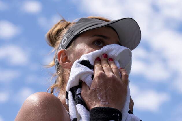 August 14, 2022, TORONTO, ON, CAN: Beatriz Haddad Maia, of Brazil, wipes her face during her defeat to RomaniaöÄÃ s Simona Halep in the final of the National Bank Open tennis tournament in Toronto on Sunday, August 14, 2022. Beatriz Haddad Maia  - ZUMAc35_ 20220814_zaf_c35_089 Copyright: xChrisxYoungx
