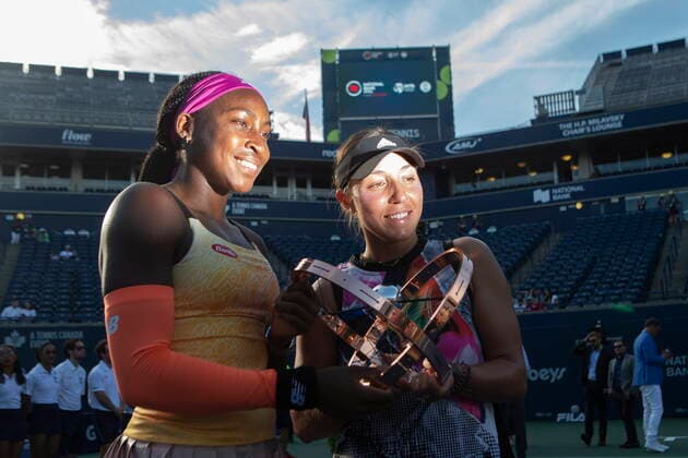 August 14, 2022, TORONTO, ON, Canada: Coco Gauff, left, and Jessica Pegula, of the United States, hold aloft the trophy after defeating Nicole Melichar-Martinez, of the United States and Ellen Perez, of Australia, during the National Bank Open double finals tennis tournament in Toronto on Sunday, August 14, 2022. Coco Gauff; Jessica Pegula - ZUMAc35_ 20220814_zaf_c35_170 Copyright: xChrisxYoungx