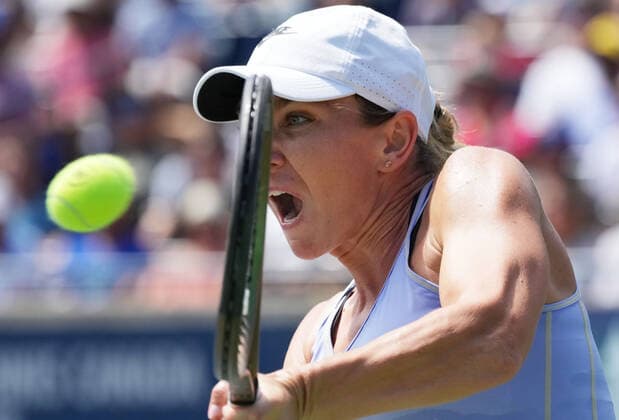 (220815) -- TORONTO, Aug. 15, 2022 -- Simona Halep of Romania returns the ball during the women s singles final between Beatriz Haddad Maia of Brazil and Simona Halep of Romania at the 2022 National Bank Open tennis tournament in Toronto, Canada, Aug. 14, 2022. (Photo by Xinhua) (SP)CANADA-TORONTO-TENNIS-NATIONAL BANK OPEN-WOMEN S SINGLES ZouxZheng 
