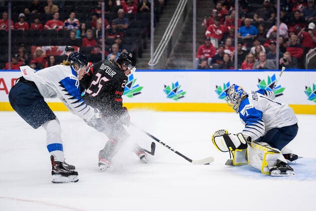 220815 Joni Jurmo and goaltender Leevi Meriläinen of Finland are being challenged by William Dufour of Canada during the 2022 IIHF World Junior Championship group stage game between Canada and Finland on August 15, 2022 in Edmonton. Photo: Joel Marklund BILDBYRAN kod JM JM0360 bbeng ishockey Ice hockey, Eishockey jvm junior-vm u20 2022 iihf world junior championship world juniors canada kanada finland Copyright: JOELxMARKLUND BB220815JM053