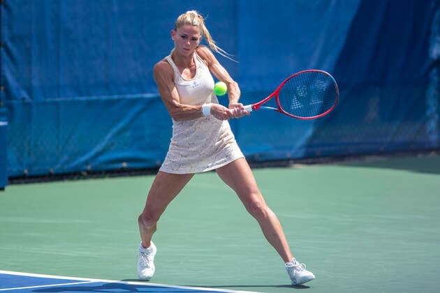 September 15, 2022, Mason, OH, USA: Western and Southern Open Tennis, Mason, OH - Camilla Giorgi plays the ball against opponent Marta Kortyuk. August 16, 2022 - ZUMA Press Mason USA - ZUMAn24_ 20220915_zaf_n24_013 Copyright: xWallyxNellx