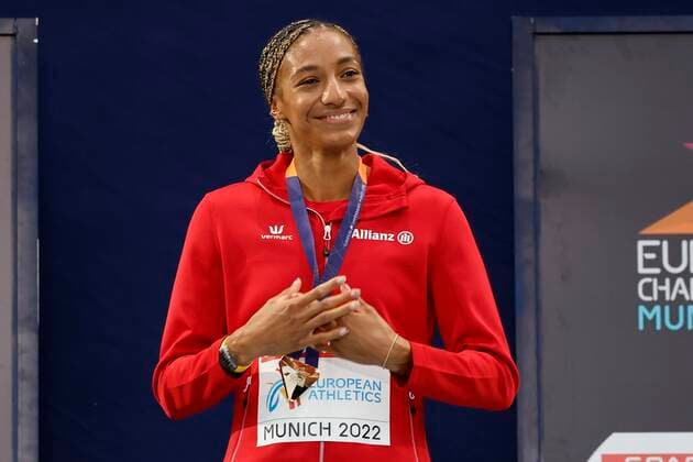 Munich, Germany - August 19 : Thiam Nafi Athletics Heptathlon (Female) of Belgium pictured during the podium ceremony with Kalin Annik of Switzerland second place and third place Adrianna SuBek of Polen during the 2022 European Championships Athletics as part of the European Championships Munich 2022 on August 19, 2022 in Munich, Germany, 19 08 2022 ( European Championship, EM, Europameisterschaft Athletics Munich 2022 PhotoNews Panoramic 