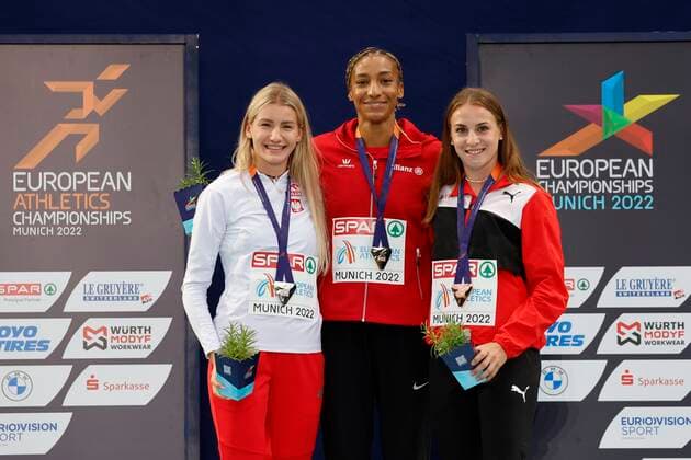 Munich, Germany - August 19 : Thiam Nafi Athletics Heptathlon (Female) of Belgium pictured during the podium ceremony with Kalin Annik of Switzerland second place and third place Adrianna SuBek of Polen during the 2022 European Championships Athletics as part of the European Championships Munich 2022 on August 19, 2022 in Munich, Germany, 19 08 2022 ( European Championship, EM, Europameisterschaft Athletics Munich 2022 PhotoNews Panoramic 