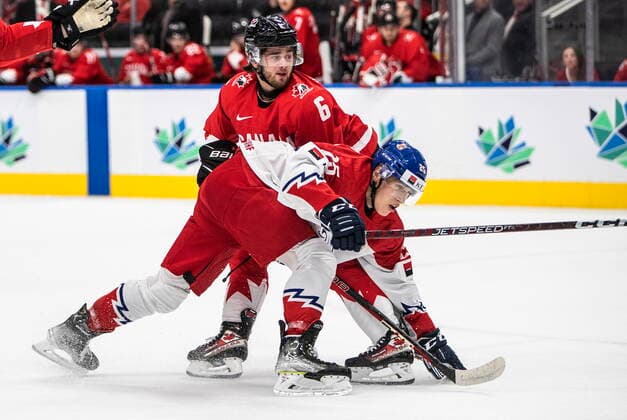 August 19, 2022, EDMONTON, AB, CANADA: Canada s Lukas Cormier (6) checks Czechia s Jiri Kulich (25) during first period IIHF World Junior Hockey Championship semifinal action in Edmonton on Friday August 19, 2022. Canada News - August 19, 2022  - ZUMAc35_ 20220819_zaf_c35_066 Copyright: xJasonxFransonx
