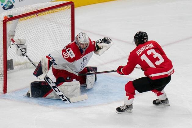 August 19, 2022, Edmonton, Alberta, Canada: TOMAS SUCHANEK (30) of Czechia makes the save against KENT JOHNSON (13) of Canada on the breakaway during the second period of a 2022 IIHF World Junior Championship semi-final playoff match at Rogers Place in Edmonton, Alberta. Edmonton Canada - ZUMAh176 20220819_zsp_h176_026 Copyright: xMatthewxHelfrichx