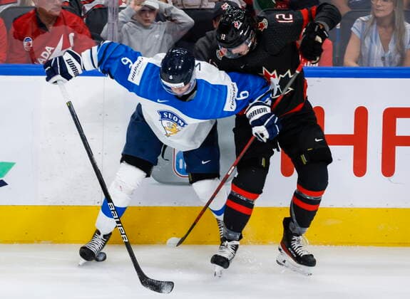 August 20, 2022, Edmonton, AB, CANADA: Finland defenceman Eemil Viro, left, checks Canada forward Tyson Foerster during first period IIHF World Junior Hockey Championship gold medal game action in Edmonton on Saturday August 20, 2022. Eemil Viro, Tyson Foerster  - ZUMAc35_ 20220820_zaf_c35_054 Copyright: xJeffxMcintoshx
