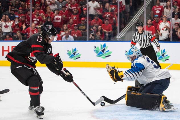 August 20, 2022, EDMONTON, AB, CANADA: Canada s Kent Johnson (13) is stopped by Finland s goalie Juha Jatkola (31) during second period IIHF World Junior Hockey Championship gold medal game action in Edmonton on Saturday August 20, 2022. Canada News - August 20, 2022  - ZUMAc35_ 20220820_zaf_c35_080 Copyright: xJasonxFransonx