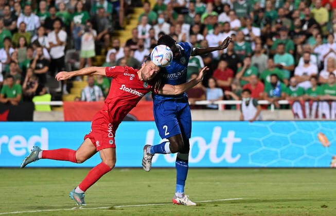 Omonia s Adam Matthews and Gent s Joseph Okumu fight for the ball during a soccer game between Cypriot Omonia Nicosia and Belgian KAA Gent in Nicosia, Cyprus on Thursday 25 August 2022, the return leg of the play-offs for the UEFA Europa League competition. DAVIDxCATRY  x40929704x
