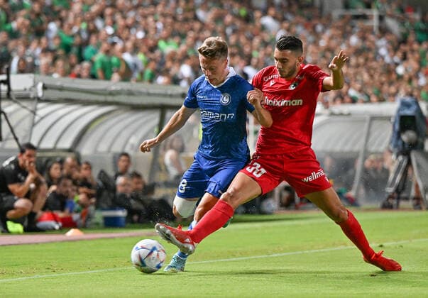 Gent s Matisse Samoise and Omonia s Nikolas Panayiotou fight for the ball during a soccer game between Cypriot Omonia Nicosia and Belgian KAA Gent in Nicosia, Cyprus on Thursday 25 August 2022, the return leg of the play-offs for the UEFA Europa League competition. DAVIDxCATRY  x40930137x