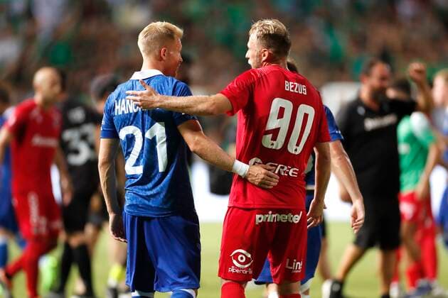 NICOSIA, CYPRUS - AUGUST 25 : Olsen Hanche Andreas defender of KAA Gent - Bezus Roman forward of Omonia during the UEFA Europa Conference league Fourth Qualifying Round match second leg between Omonia Nicosia and Kaa Gent on august 25, 2022 in Nicosia, Cyprus, 25 08 2022 ( Omonia Nicosia v Kaa Gent - Conference League PhotoNews Panoramic 