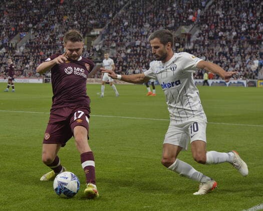 Heart of Midlothian v FC Zürich UEFA Europa League Alan Forrest of Heart of Midlothian and Antonio Marchesano of FC Zürich battle for the ball during the UEFA Europa League Play-Off Second Leg match at Tynecastle Park, Edinburgh Content Not Available For UK Newspapers Copyright: xJamiexJohnstonx FIL-17264-0081 UK Newspapers OUT
