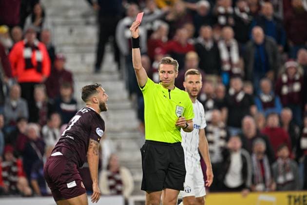 Heart of Midlothian v FC Zurich Europa League 25 08 2022. Play Off Second Leg RED CARD Referee Lawrence Visser (BEL) shows a red card to Hearts Jorge Grant during the Europa League match between Heart of Midlothian and FC Zurich at Tynecastle Park, Edinburgh, Scotland on 25 August 2022. Editorial use only , Copyright: xMalcolmxMackenziex PSI-15818-0012