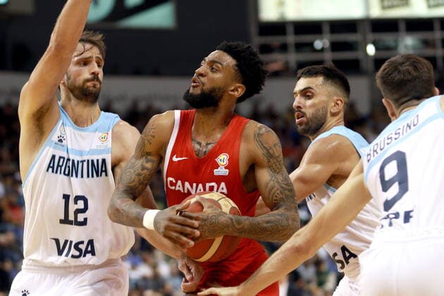 August 25, 2022, VICTORIA, BC, CAN: Canada s Nickeil Alexander-Walker controls the ball against Argentina players during second half action of the FIBA Basketball World Cup 2023 Americas Qualifiers in Victoria, B.C., on Thursday, August 25, 2022. Nickeil Alexander-Walker  - ZUMAc35_ 20220825_zaf_c35_205 Copyright: xChadxHipolitox