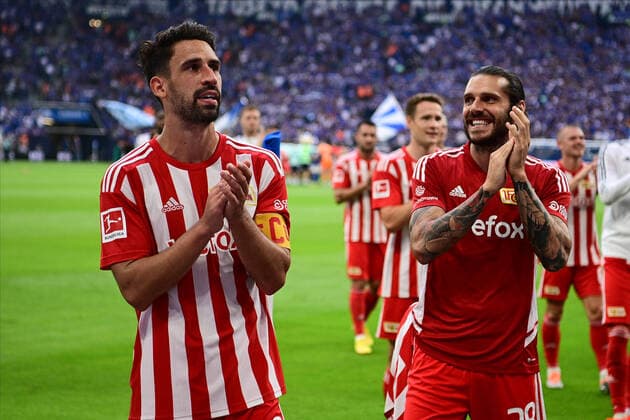 GELSENKIRCHEN, GERMANY - AUGUST 27, 2022: Rani Khedira and Christopher Trimmel celebrating won. The football match of Bundesliga FC Schalke 04 vs Union Berlin  Copyright: xVITALIIxKLIUIEVx