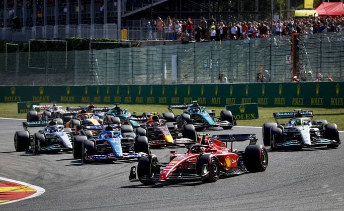 SPA - Carlos Sainz (55) driving the Ferrari ahead of Lewis Hamilton (44) driving the Mercedes W13 and Fernando Alonso (14) driving the Alpine A522 during the F1 Grand Prix of Belgium at the Circuit de Spa-Francorchamps on August 29, 2022 in SPA, Belgium. REMKO DE WAAL F1 Grand Prix of Belgium 2022 xVIxANPxSportx xxANPxIVx