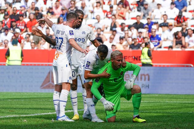 Kasper Schmeichel (OGC Nice) - Alexis Sanchez (Olympique de Marseille) - Jordan Veretout (Olympique de Marseille) - Nuno Tavares (Olympique de Marseille) FOOTBALL : OGC Nice vs Olympique de Marseille - Ligue 1 Uber Eats - Nice - 28 08 2022 NorbertScanella Panoramic 